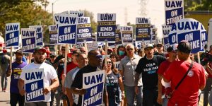 UAW says picketing workers are getting hit by cars, having guns pulled on them