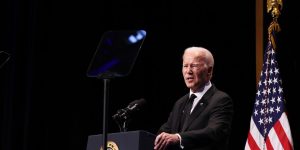 Biden interrupted by climate activist during speech, promises to meet