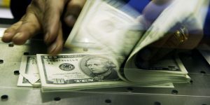 U.S. dollar hits strongest level in nearly a year, heaping more pressure on stocks