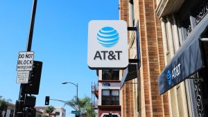 AT&T’s stock surges as company beats on key metric, boosts earnings outlook
