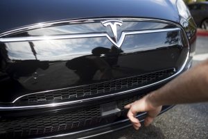 Tesla misses delivery estimates as factory upgrades curb production