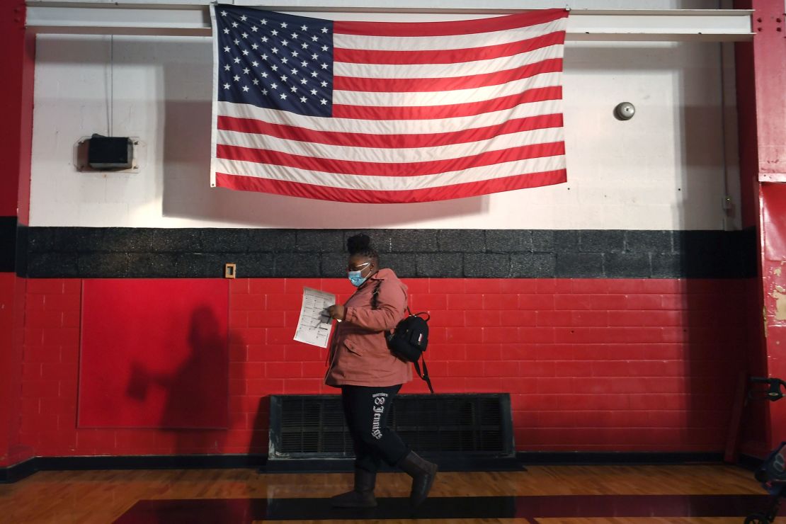 A voter casts their ballot at a polling location in St. Louis, Missouri, in November 2020. The Searle trust has given millions to the Foundation for Government Accountability, which has worked behind the scenes to push conservative policies such as stricter voting laws.