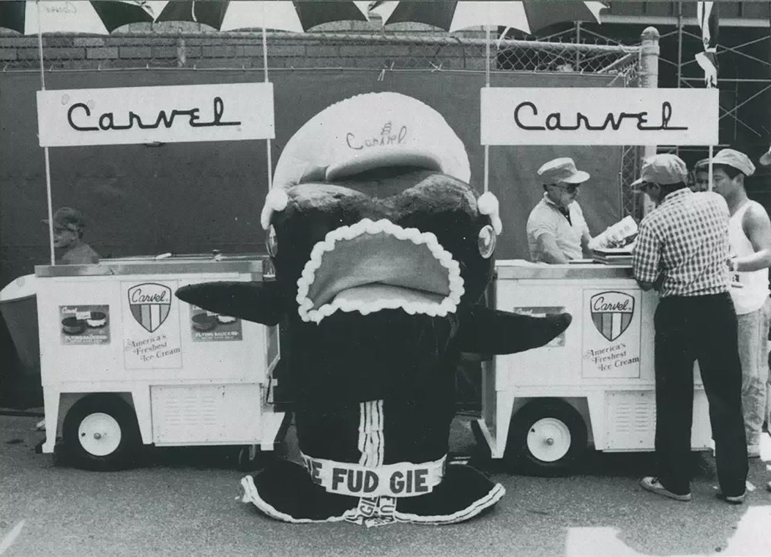 The first iteration of Fudgie the Whale mascot.